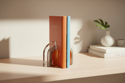 Bey-Berk Archer Clear & Orange Crystal Bookends