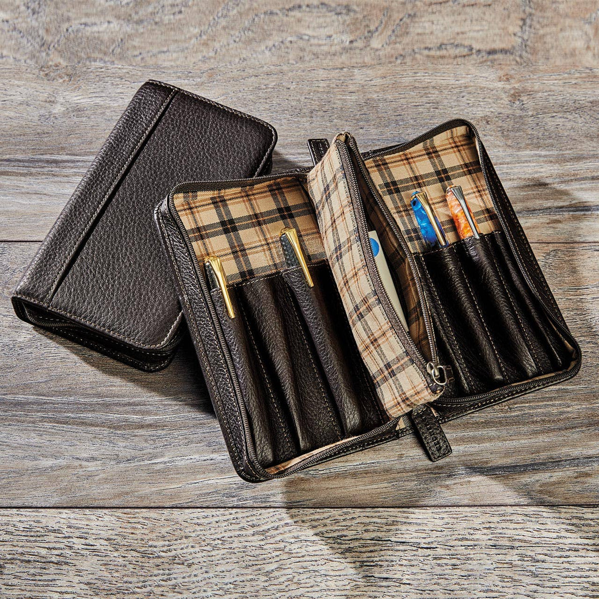 Levenger Bomber Jacket mocha leather pen case open with fountain pens and writing instruments